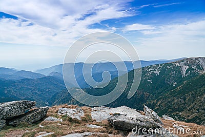 Panorama of Carpathians mountains and famous Transalpina road. Romaniaâ€™s scenic drives Transalpina, climbing to the top of a Stock Photo